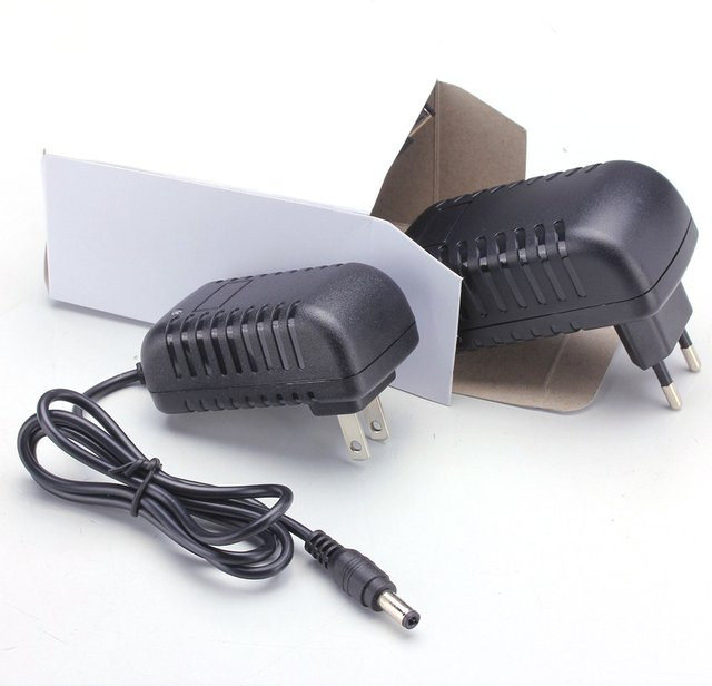 Lamakoki AC/DC-Adapter Ladegerät 30V 500mA 0,5A in Schwarz - Bild 1