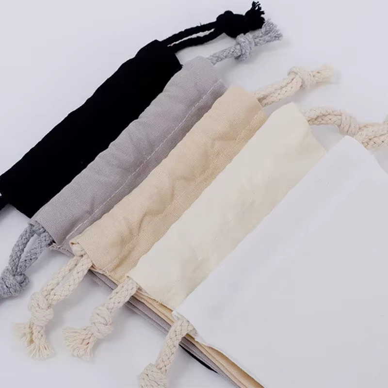 Wiederverwendbare Baumwoll-Aufbewahrungstaschen aus weißem Segeltuch mit Kordelzug zur Organisation von Kleinigkeiten und als Geschenkverpackung - Bild 2