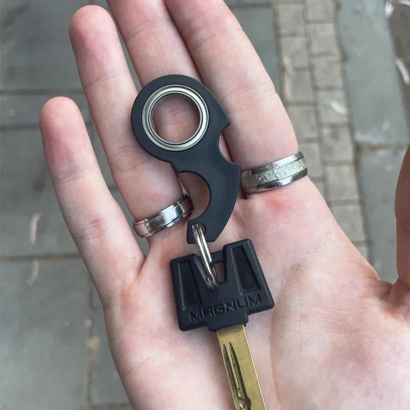 Yiran bag Schlüsselanhänger Spinner Nachtleuchtender Schlüsselring - Bild 1
