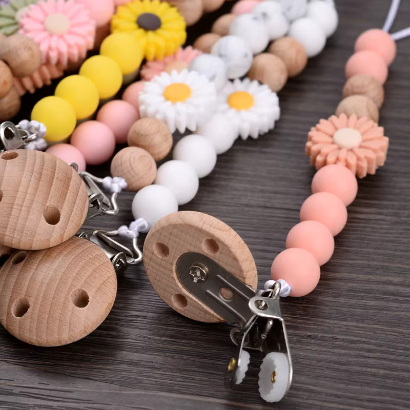 Schnullerhalter Kette für Babys aus Buche Holz und Silikon mit Blumenperlen in Mehrfarbig - Bild 3