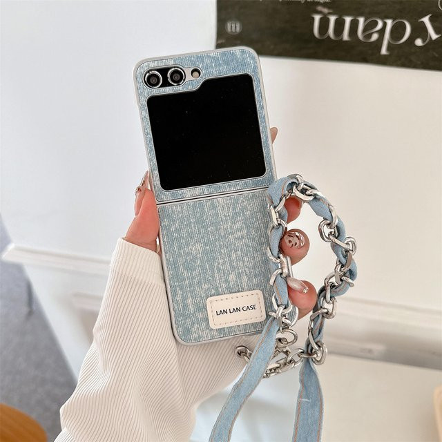 Samsung Galaxy Z Flip 6 5 4 3 5G Stoßfeste Handyhülle aus Leder mit Handgelenkschlaufe in Blau - Bild 1