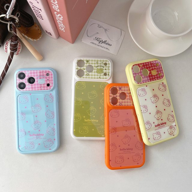 Sanrio Hello Kitty Handyhülle mit Karomuster und Punkten in Gelb für iPhone 14 15 16 17 Pro Max, stoßfeste weiche Rückseite mit Linsenschutz - Bild 1