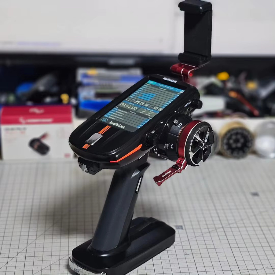 Radiolink RC8X 8-Kanal 2,4G RC-Sender mit R8FG V2.1 Gyro-Empfänger, Einhand-Steuerung und Telefonhalterung für FPV-Bildschirm, Schwarz - Bild 2