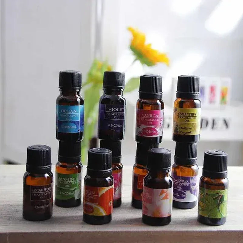 Natürliches ätherisches Öl als Auto-Parfüm Nachfüllung für Lufterfrischer und Aroma Diffusoren, 10 ml, Glas, mehrfarbig - Bild 1