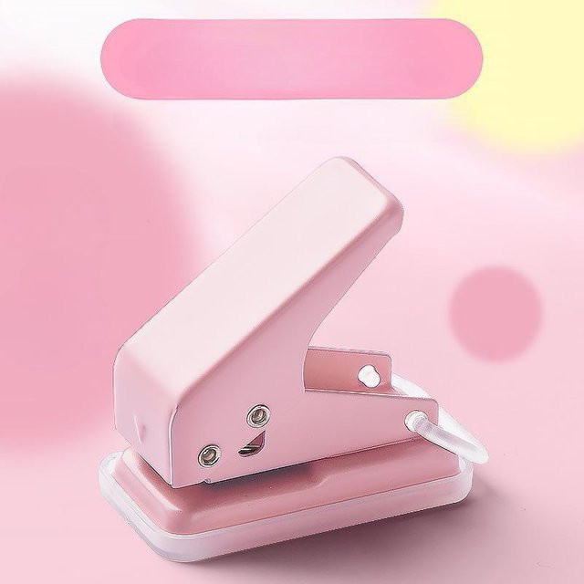 Mini-Einzelring-Lochstanzer von HaiKouLiJinHaiKeJiYouXianGongSi in Rosa für Büro und Schule - Bild 1
