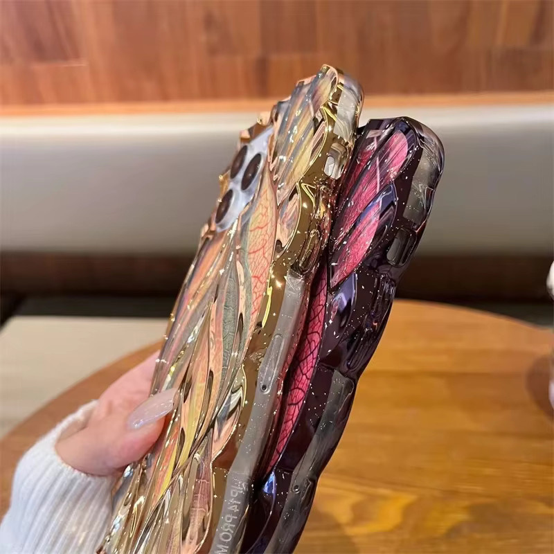 Luxuriöse Apple iPhone Schutzhülle mit farbigem Baumblatt-Beschichtung und weichem Rahmen in Schwarz und Multicolour - Bild 2