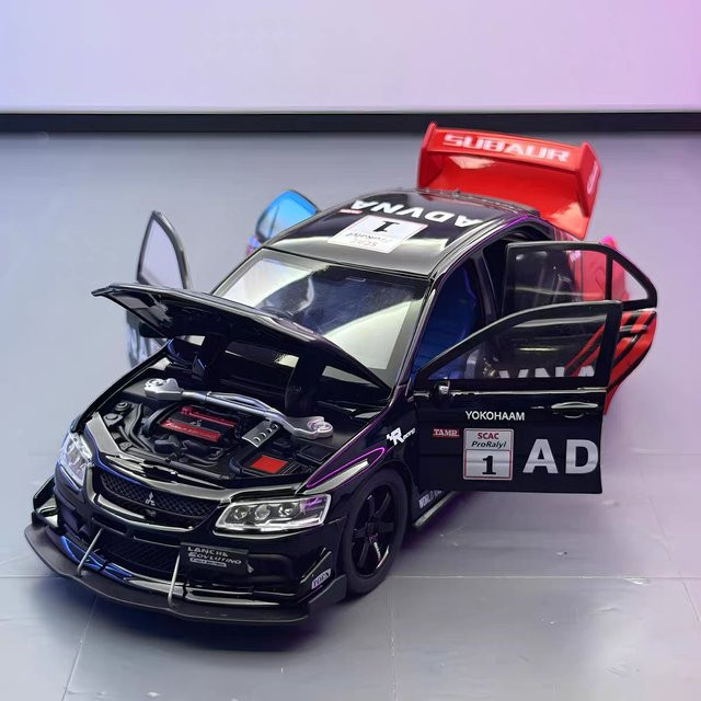 MAKEDA Mitsubishi EVO GTR R34, Diecast Modell, 1:32, Metall, Türen geöffnet - Bild 1
