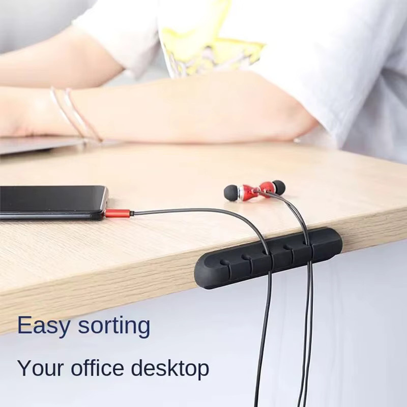Selbstklebender Kabelmanager aus Silikon in Schwarz als Desktop-Organizer mit Fixierhalterung für Mauskabel, Headset und Handy-Datenkabel - Bild 3