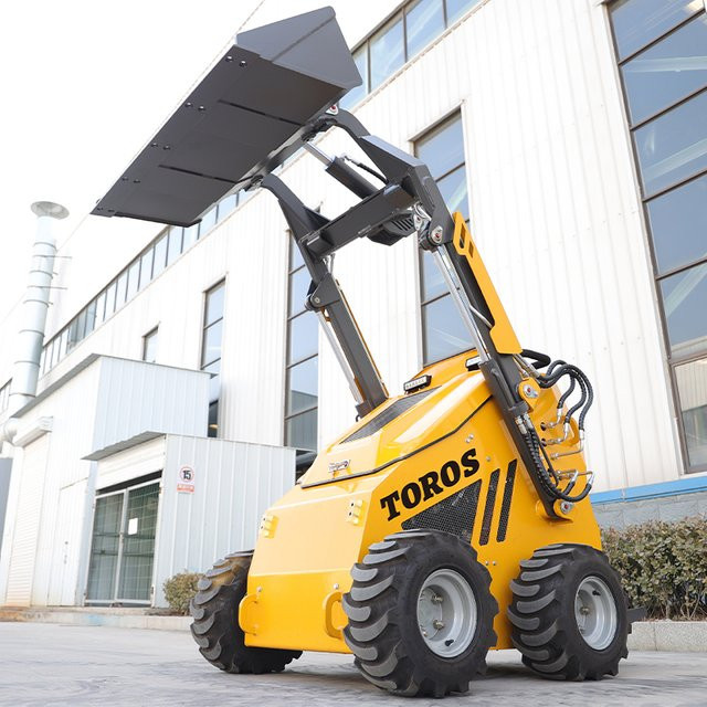 Gelber Mini-Kompaktlader mit EURO 5 EPA Standard, Tragkraft 500 kg bis 1 Tonne - Bild 1