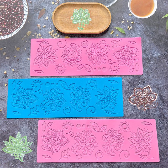 Silikonform für Schokolade und Zucker mit Blumen- und Blattmotiven in Rot und Pink - Bild 1