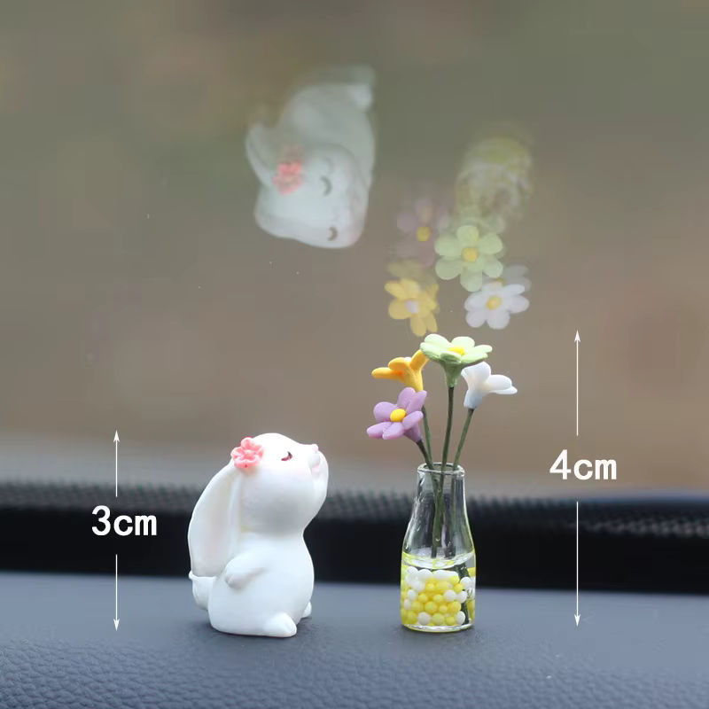 Miniatur Kaninchen mit Gänseblümchen als Auto Ornament aus Kunstharz in Weiß - Bild 4