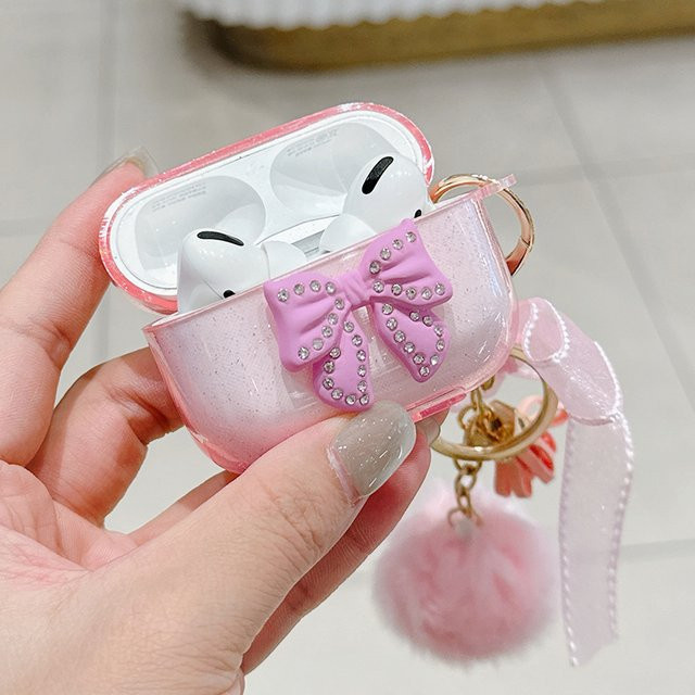 Handgefertigte Apple AirPods Schutzhülle in Pink mit Glitzer-Schleife und Plüsch-Schlüsselanhänger für AirPods Pro 2, AirPods 3 und AirPods 1/2 - Bild 1