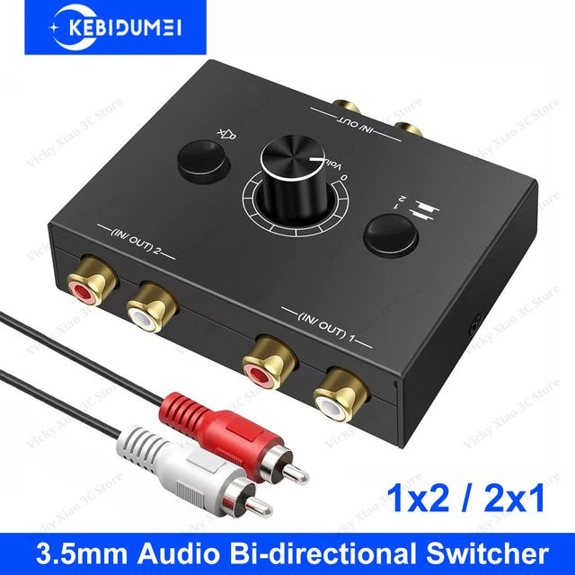 Kebidumei Bidirektionaler RCA-Audio-Schalter mit Stummschalttaste, 2-in-1-Ausgang/1-in-2-Ausgang Stereo-Audio-Adapter für Lautsprecher, Schwarz - Bild 1