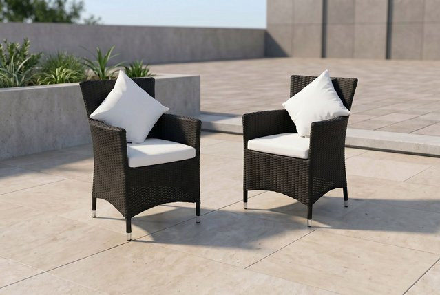 OUTFLEXX 2er Set Sessel aus Polyrattan in Schwarz inklusive Kissen und Polster mit Armlehnen - Bild 1