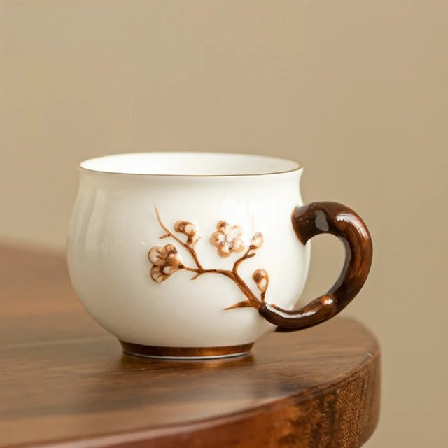 Handgemachte Porzellan Teetasse mit Pflaumenblüten-Relief in Jade, 80 ml - Bild 1