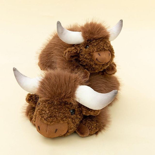Niedliche liegende Wildrinder Plüschtiere, Stofftiere, 40cm, ab 14 Jahre - Bild 1