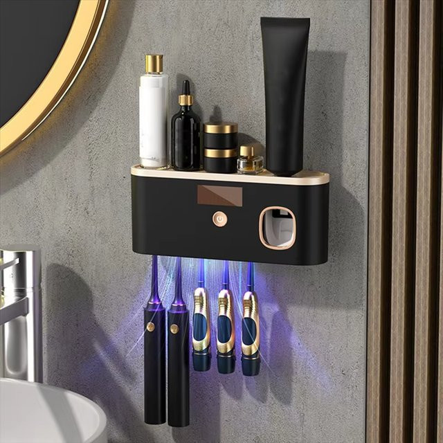NOCCLILI 3-in-1 Elektrische Zahnbürsten-Desinfektionsvorrichtung mit Zahnpasta-Spender, Wandmontierter Zahnbürstenhalter in Schwarz und Gold - Bild 1