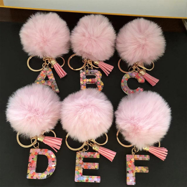 Fishsheep Schlüsselanhänger Acryl, rosa Bommel, Glitzer, Alphabet-Charm, Unisex - Bild 1