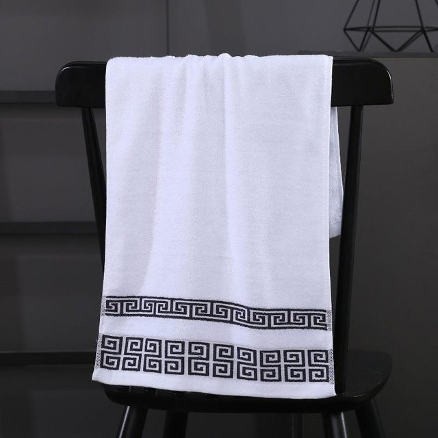 Weißes Baumwollhandtuch mit geometrischer Bestickung, B/H: 35 x 75 cm - Bild 1