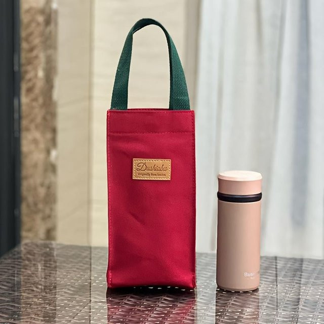 NATAWA Beuteltasche für Reisebecher in Marineblau mit grünen Henkeln - Bild 1