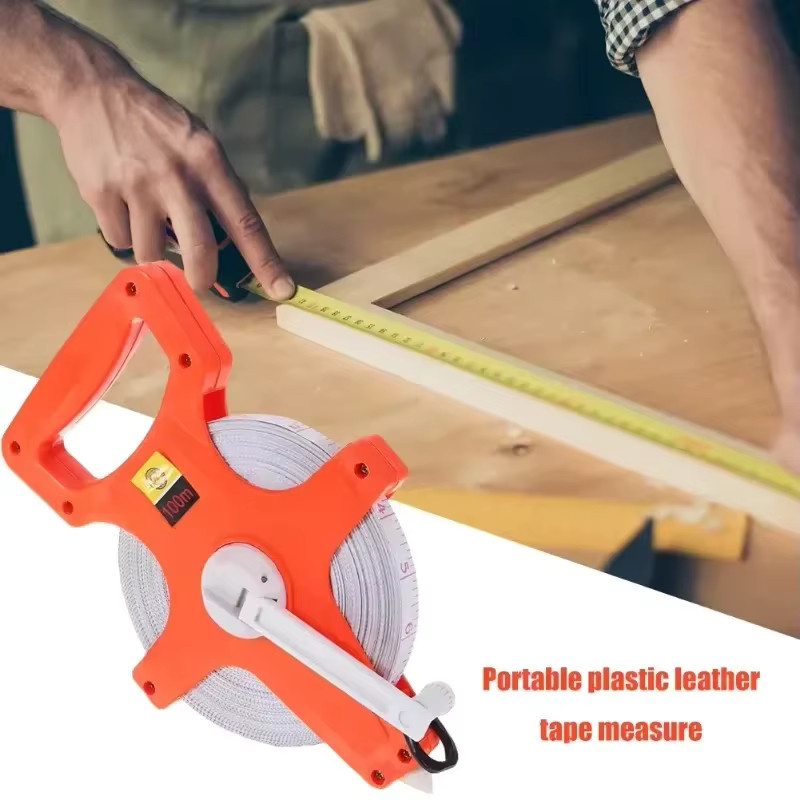 Schlagfestes Fiberglas-Maßband in Orange mit metrischer Skala und Zoll-Angaben - Bild 2