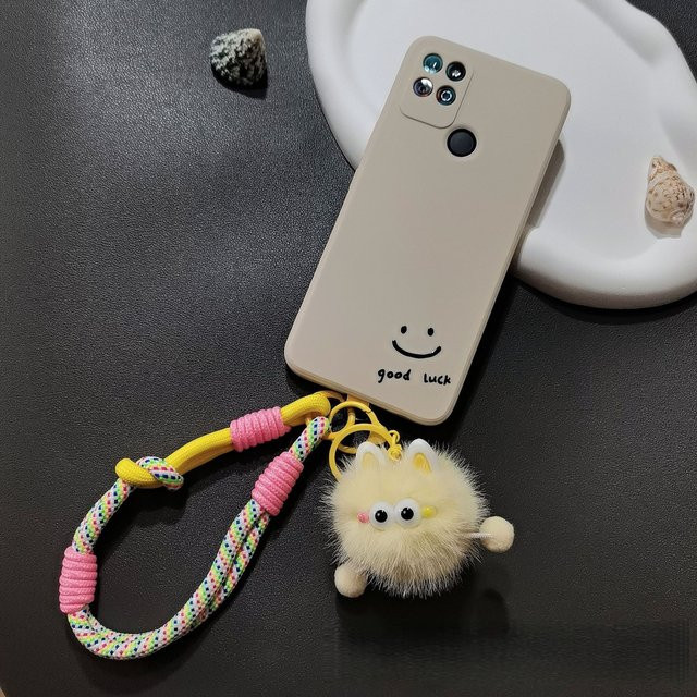 Buntes Cartoon-Plüsch-Handyband als Handgelenkband in Multicolor und Weiß zum Schutz deines Smartphones - Bild 1