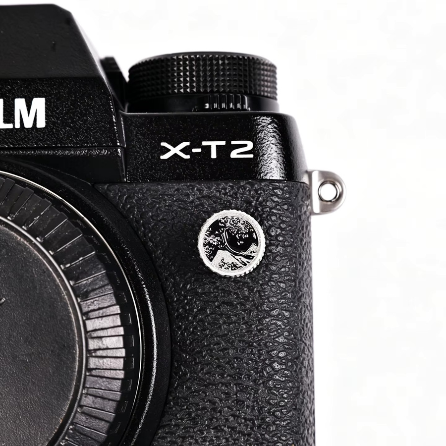 Fujifilm PC-Sync-Anschlussabdeckung für Blitzfernbedienung in Schwarz und Blau - Bild 1