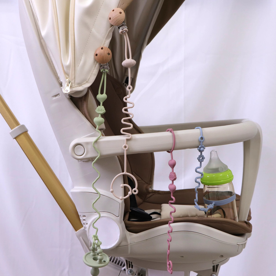 4er-Set verstellbare Silikon-Schnullerkette mit Beißring in Beige und Multicolour, BPA-frei - Bild 2