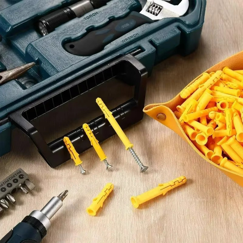 Sortiment an selbstschneidenden Edelstahlschrauben und Wandbohrstopfen in Gelb zur Befestigung im Trockenbau - Bild 3