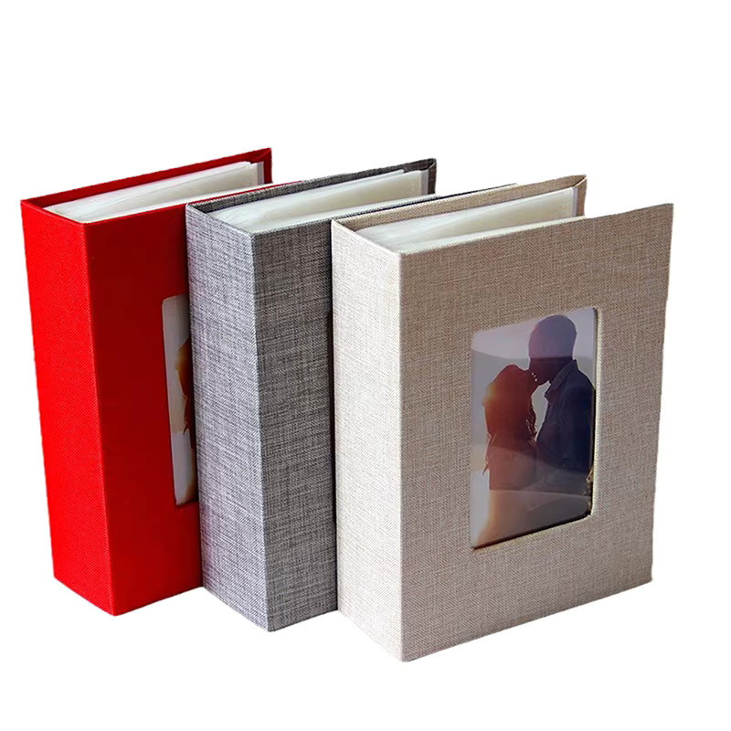 Beschreibbares Fotoalbum aus Leinen in Weiß mit 100 Taschen für 4x6 Fotos zur Aufbewahrung deiner Erinnerungen - Bild 6