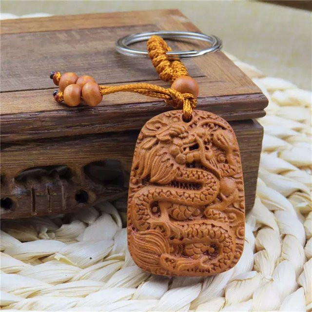 Noter Schlüsselanhänger Holz, Kugel Drachen, Unisex - Bild 1