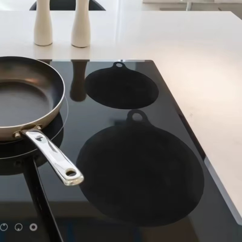 4er-Set Silikon Matten für Induktionskochfelder und Air Fryer in Schwarz - Bild 4