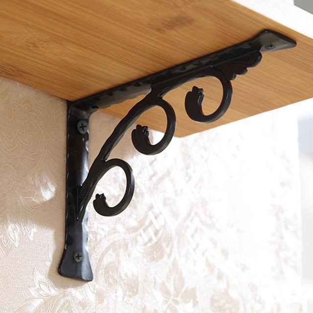 Wandregal in L-Form mit Blumenmuster aus Metall in Schwarz, B/H: 25 x 20 cm - Bild 1