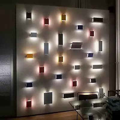 Nemo Lighting Wandleuchte Nemo Applique mit schwenkbarem Panel aus poliertem Edelstahl in Silber, Durchmesser: 34 cm