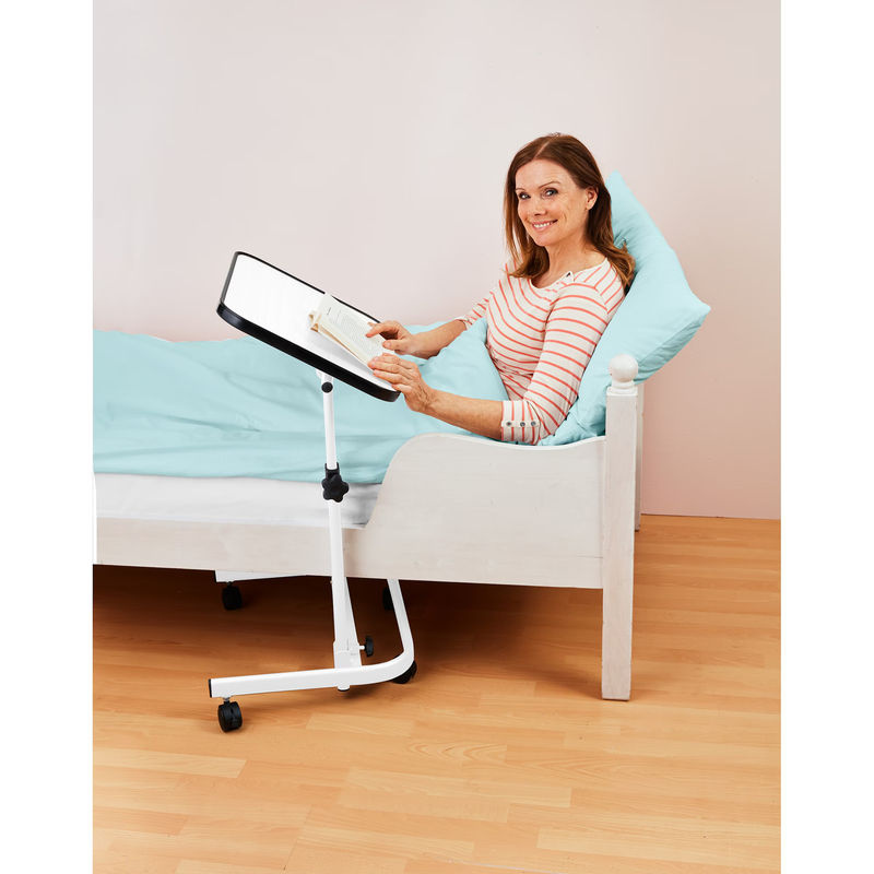 Mobiler Beistelltisch von REHAFORUM MEDICAL in Weiss und Silber mit höhenverstellbarer und neigbarer Tischplatte und Rollen für das Bett - Bild 2