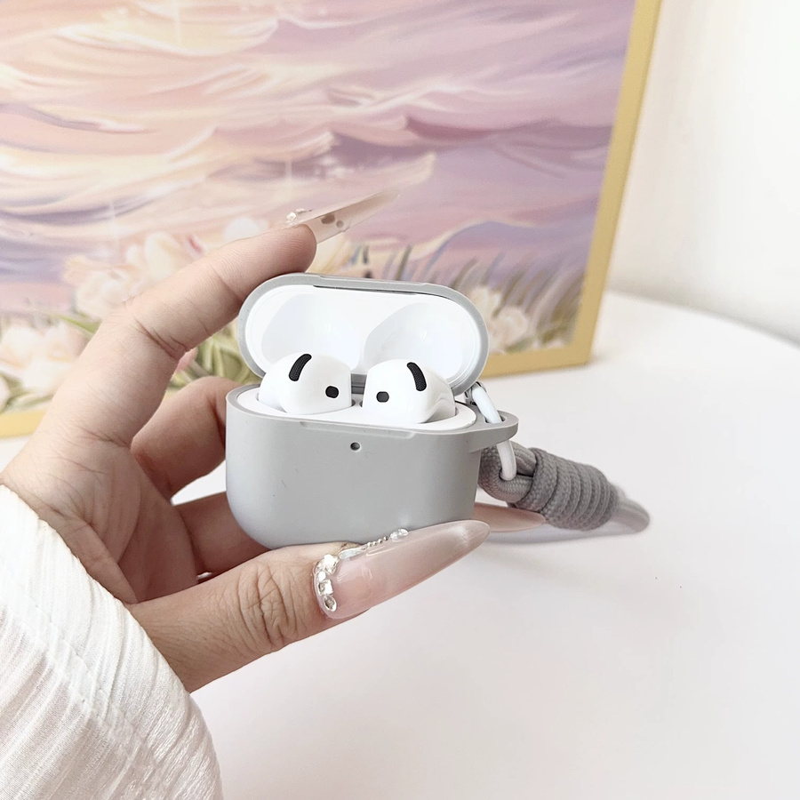 Slim Silikonhülle für Apple AirPods Pro 2 und AirPods 4 Pro 3. Generation mit Handgelenkband in Orange - Bild 2