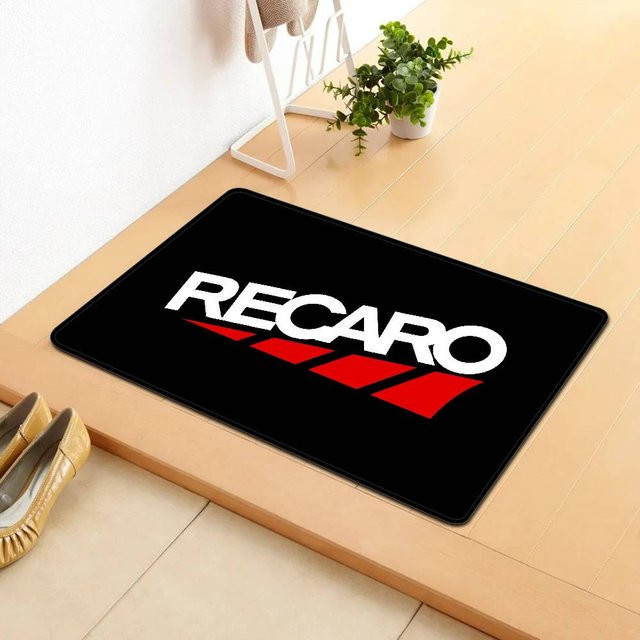 Recaros Logo-Raummatte in Schwarz, rutschfest und wasserabsorbierend mit Streifenmuster - Bild 1