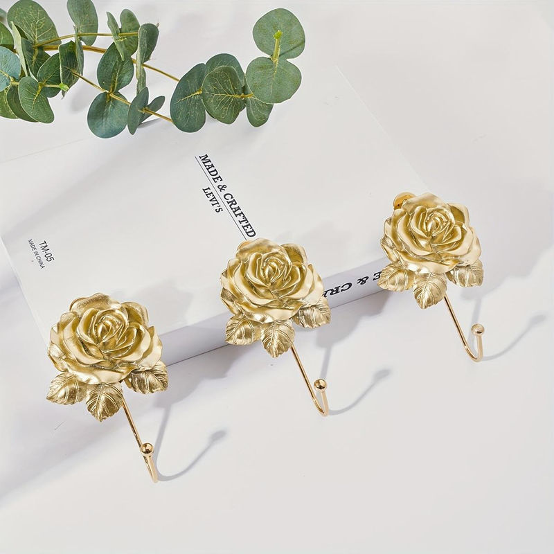 Dekorativer Wandhaken in Gold mit Rosen-Design aus Harz für Kleidung und Handtücher - Bild 2