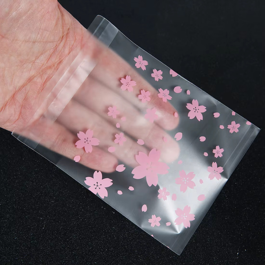 100 Stück transparente selbstklebende Verpackungsbeutel mit Kirschblüten-Motiv von Linsoir Beads für DIY-Schmuck, Backwaren und Kekse - Bild 2