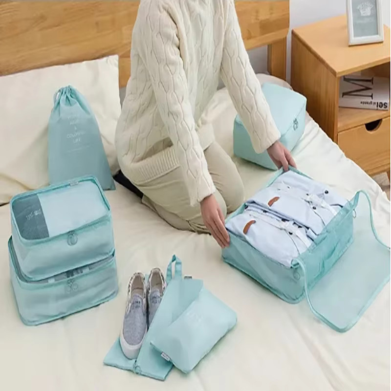 7-teiliges Set Reise-Organizer aus Mesh-Gewebe in Blau für die ordentliche Aufbewahrung von Kleidung und Schuhen im Koffer - Bild 1