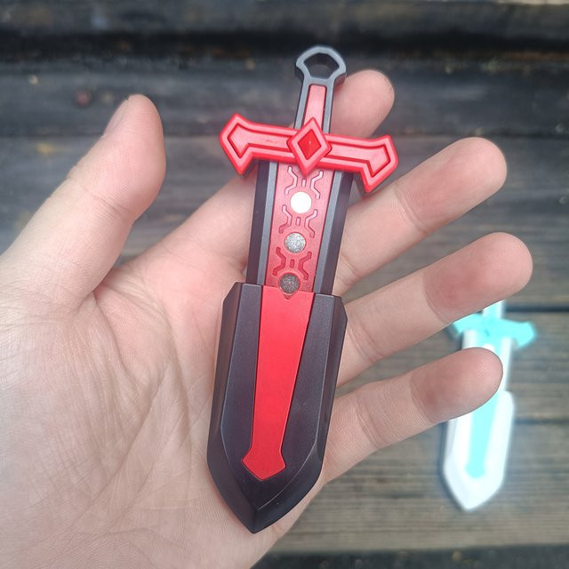 Schwert Push Karte Mini Fingertip Spielzeug, Magnetischer Anhänger - Bild 1