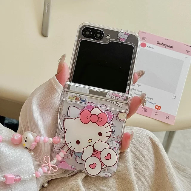 Sanrio Hello Kitty Handyhülle mit Ständer und Umhängeband für Samsung Galaxy Z Flip 7, 6, 5, 4, 3 in Transparent - Bild 1