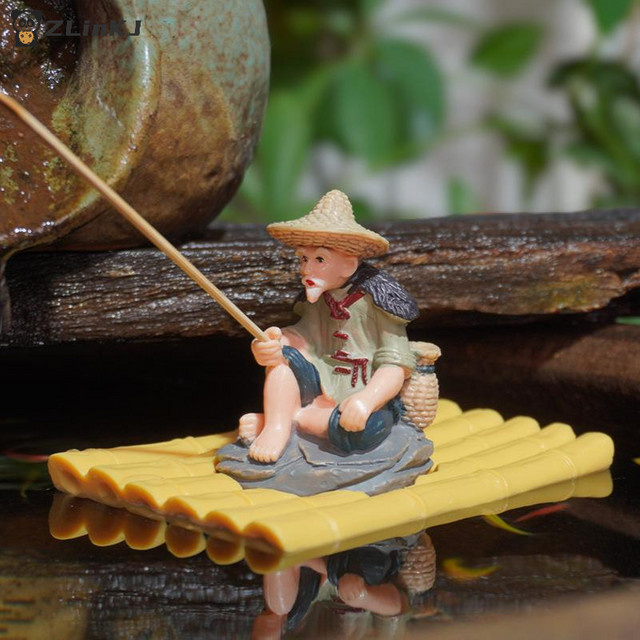JETTING Gartenfigur Fischer auf Bambusfloß aus PVC in Multicolour für Aquarium und Außendekoration - Bild 1
