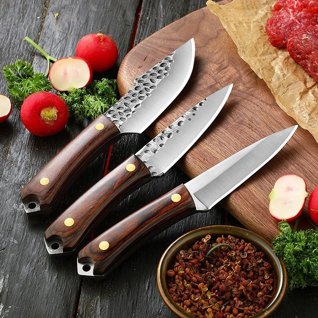 Handgeschmiedetes Küchenmesser von zxyouping mit Massivholzgriff und silberner Klinge - Bild 1
