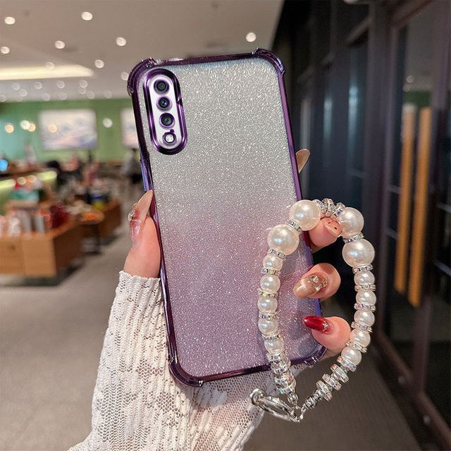 Samsung Galaxy A70 Stoßfeste TPU-Handyhülle mit Gradient Glitter Design und Perlenketten-Handgelenkband in Pink - Bild 1