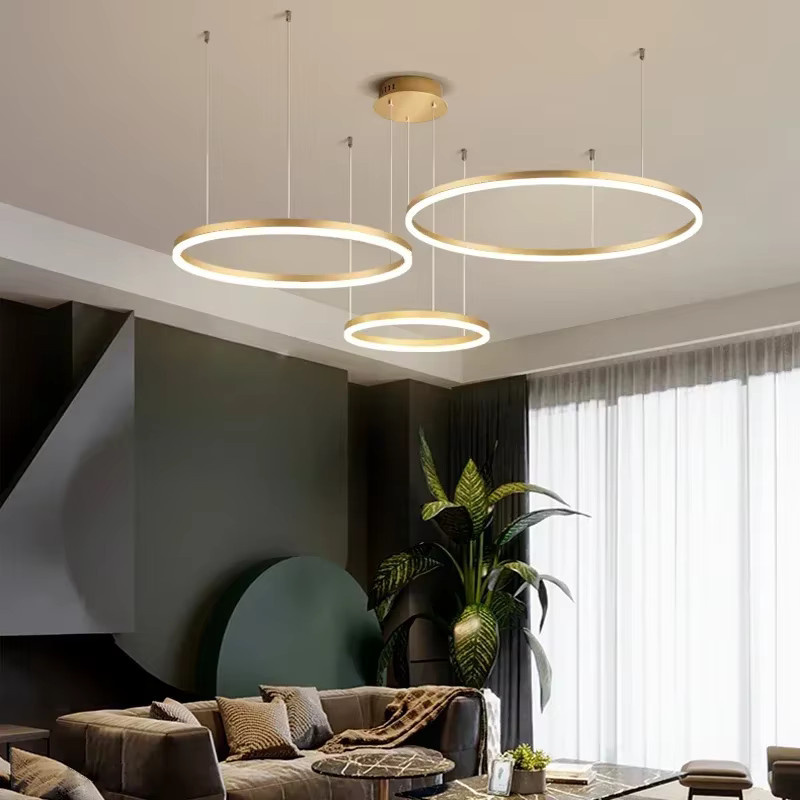 Moderne LED-Pendelleuchte in Ringform aus Metall, Gold und Braun, warmweißes Licht - Bild 2