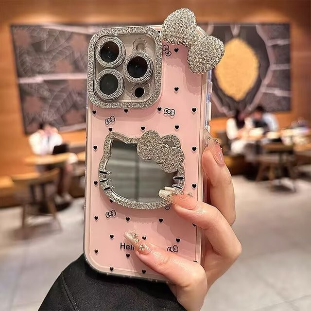 Sanrio Hello Kitty Handyhülle mit 3D Schleife und Make-up Spiegel in Pink für iPhone 17 16 15 14 13 12 11 Pro Max - Bild 1