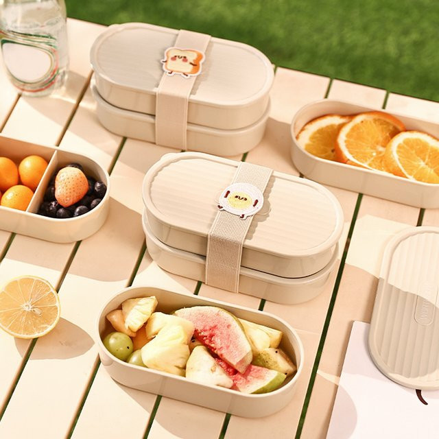WORTHBUY Ovale Bento-Box aus Kunststoff in Beige mit Unterteilungen und Snap-Lid, mikrowellengeeignet - Bild 1