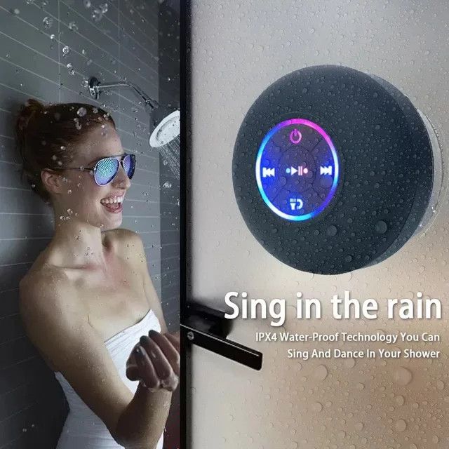 Tragbarer Bluetooth Lautsprecher mit LED-Beleuchtung und IPX4 Wasserdichtigkeit sowie Saugnapf zur Wandmontage für Badezimmer und Außenbereich - Bild 1