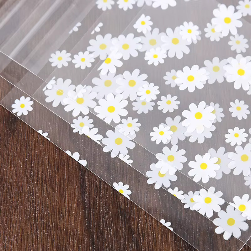 Transparente Kunststoff Geschenkbeutel mit Gänseblümchen-Design für Hochzeiten, Partys oder Weihnachten, 50 Stück - Bild 4